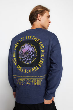 Indigo Oversize/Genis Kesim Cicek S?rt Bask?l? Ici Polarl?/S?cak Tutan Sweatshirt TMNAW23SW00493
