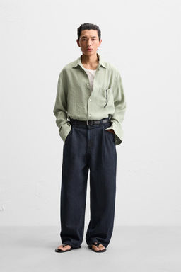 PLEATED WIDE-LEG JEANS