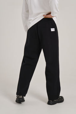 Брюки трикотажные Черный COMMUTE Knit Track Pants - Anta фото 8