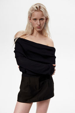 Jersey off-the-shoulder en punto transparente