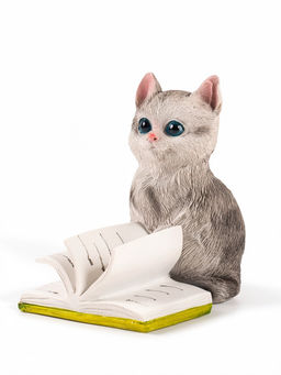 Сувенир полистоун "Котёнок листает книгу" серый 10х7,2х10,5 см