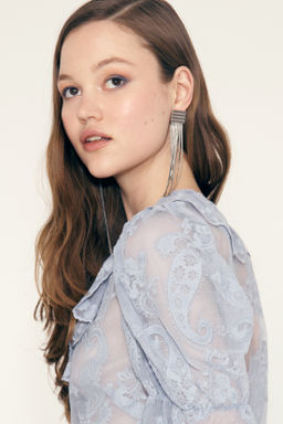 Blusa de volantes con dise?o bordado - H&m фото 7