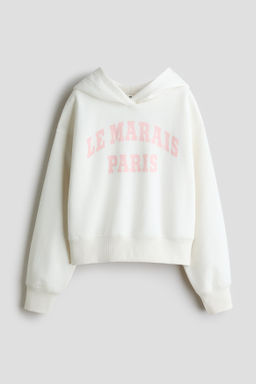 Sudadera oversize con capucha y motivo