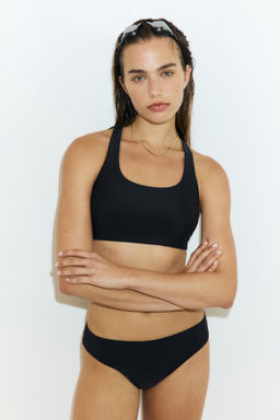 Top de bikini deportivo con Lycra® Xtra Life - H&m фото 5