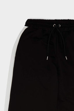 Стильные широкие спортивные штаны с широкими штанинами, эластичным поясом и полосками - Defacto фото 8