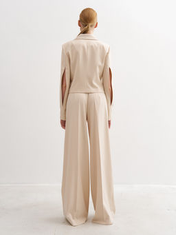 Молочные брюки палаццо