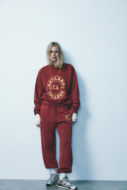 FADED VARSITY SWEATSHIRT