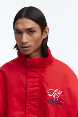 Chaqueta de ch?ndal bordada en nailon Loose Fit - H&m фото 5