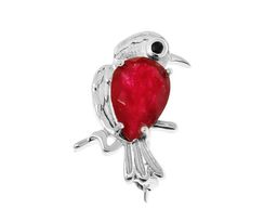 Брошь из серебра синт.рубин, шпинель, Попугай
