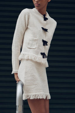 KNIT CARDIGAN WITH BOWS