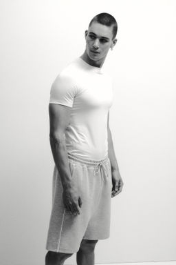 Pantal?n corto de deporte con DryMove Loose Fit - H&m фото 5