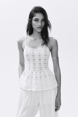 Top efecto crochet con peplum - H&m фото 2