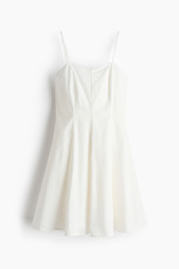 Vestido de popelina con falda acampanada