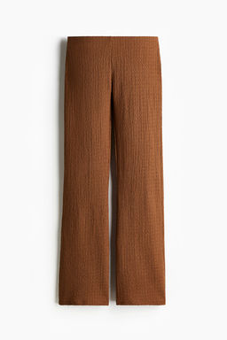 Pantalon acampanado con efecto arrugado - H&m фото 5
