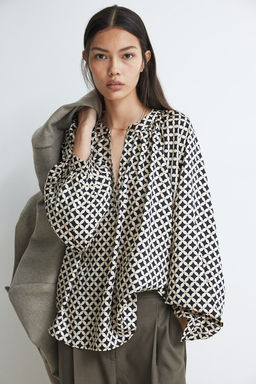 Blusa con mangas globo