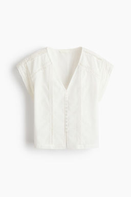 Blusa en mezcla de lino con inserciones de encaje