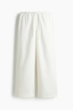 Pantal?n denim con cord?n de ajuste - H&m фото 3