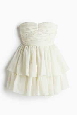 Vestido bandeau con falda acampanada