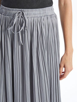 Beli Lastikli Saten Kad?n Etek