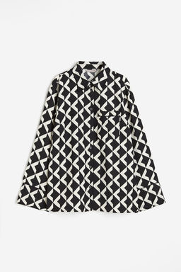 Camisa con ribete de cinta