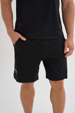Шорты трикотажные Черный ANTA ICONIC Knit Half Pants  фото 3