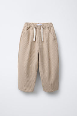 CHECKED PLEATED TROUSERS