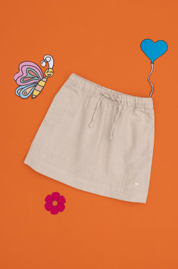 K_z _ocuk Bej Dokuma Etek Sepette S_rpriz _ndirim