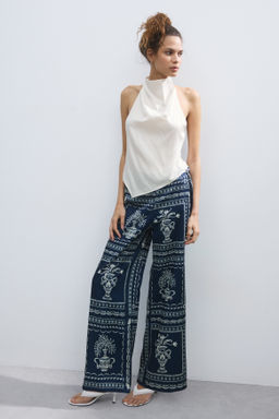 Top asim?trico con escote halter - H&m фото 5
