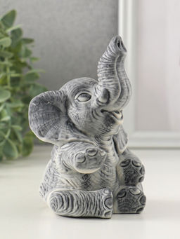 Сувенир "Слоник весёлый сидит" 12,8 см