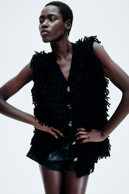 Sueter sin mangas en mezcla de lana con flecos - H&m фото 2