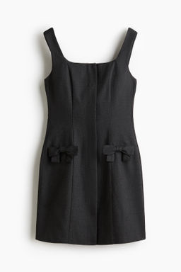 Vestido de sarga con lazos