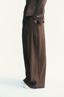DOUBLE PLEAT TROUSERS WITH FLAPS