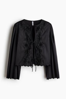 Blusa de sat?n con lazadas