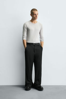 STRAIGHT-LEG TROUSERS WITH VENTS