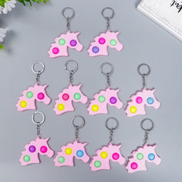 Цена за 12 шт. Брелок резина антистресс (бесконечная пупырка) Розовый единорог МИКС 9х5,6 см - Simaland фото 4