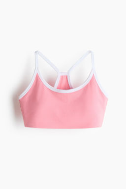 Crop top acolchado de deporte con SoftMove