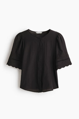 Blusa con mangas abullonadas