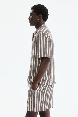 Pantal?n corto Regular Fit - H&m фото 10