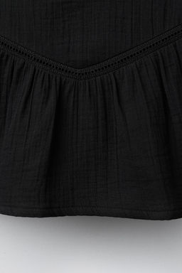 BRODERIE ANGLAISE RUFFLE SKIRT