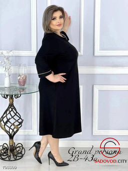 Нарядное трикотажное платье трапеция