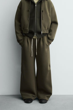 WIDE-LEG NEOPRENE-EFFECT TROUSERS WITH STUDS - Zara фото 12