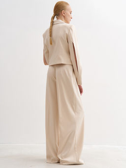 Молочные брюки палаццо