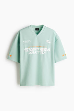 Camiseta estampada de malla Oversized Fit