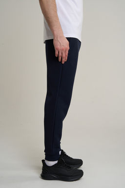 Брюки трикотажные Темно-синий TRN ESSENTIAL Knit Track Pants - Anta фото 4