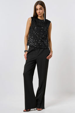 Блузка из мягкого трикотажа с пайеткой черная