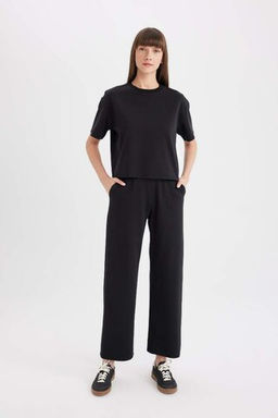 Черная женская базовая футболка с круглым вырезом и короткими рукавами, свободный крой - Defacto фото 2