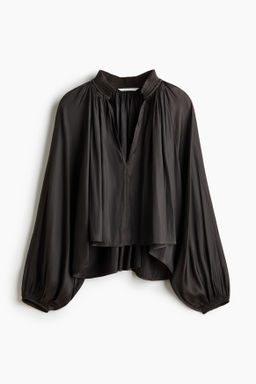 Blusa oversize con escote en V
