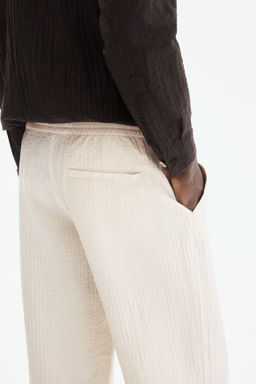 Pantal?n texturizado Relaxed Fit - H&m фото 11