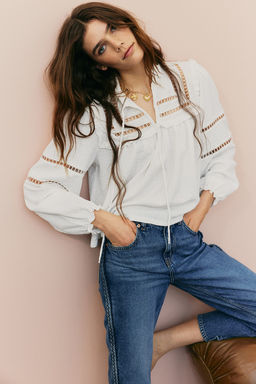 Blusa oversize con ribetes de volante