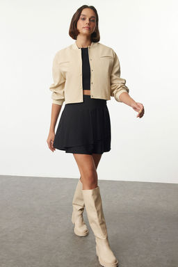 TRENDYOLMILLA Siyah Asimetrik Pilili Dokuma Etek Gorunumlu Sort TWOAW25SR00025